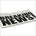 Newspaper with headlinge Breaking news